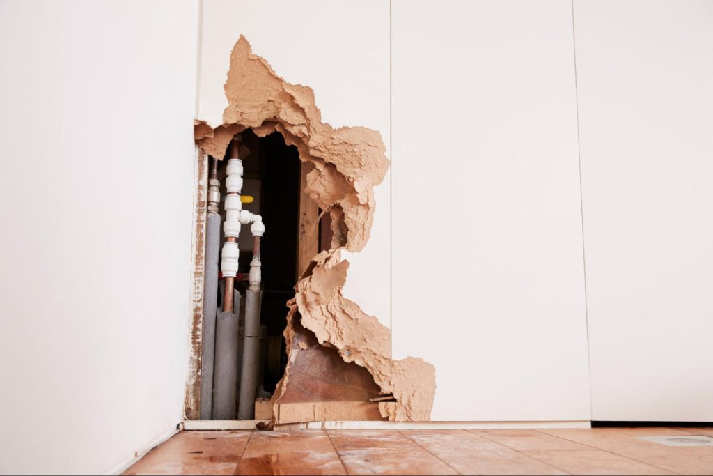 Water damage from a pipe inside of a home.