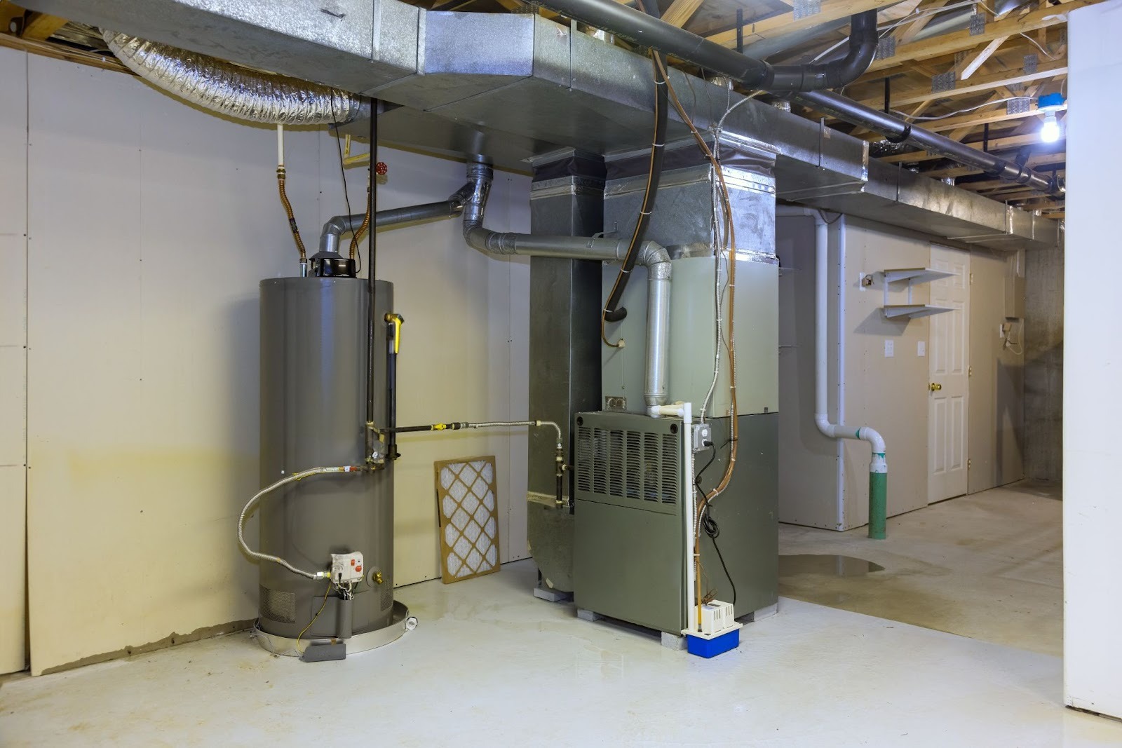 Home furnace installation with gas heating unit and ventilation connections